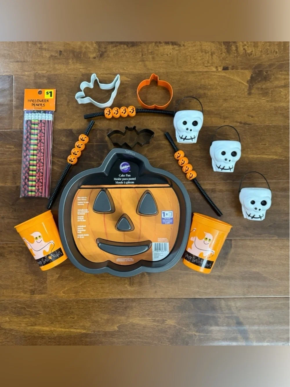 Skeleton costume, Halloween cake pan, cups, straws, cookie cutters & pencils